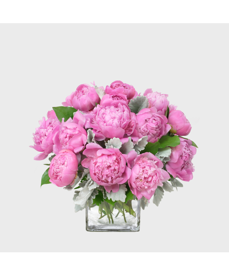 Indulge in the timeless beauty of Pretty in Peony, a breathtaking arrangement featuring 10 lush pink peonies in full bloom. 