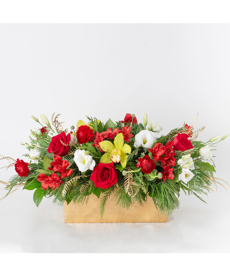 Celebrate the season with our Holly Jolly Christmas Centerpiece, a festive arrangement that brings elegance and joy to any table.