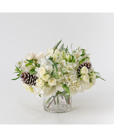 Celebrate the season with the Nutcracker arrangement, a timeless display of winter elegance. 