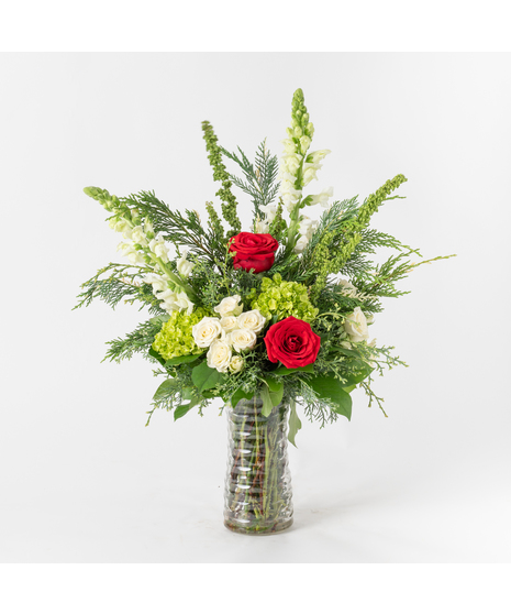 The Peppermint Pattie arrangement is a fresh and festive delight, perfect for adding elegance to your holiday décor.