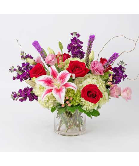 Celebrate love with our Lovely arrangement, a bouquet as enchanting as your special someone.