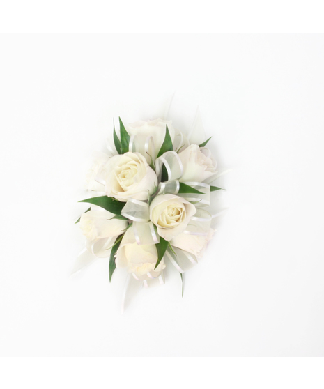 You can never go wrong with a simple spray rose corsage with rose blooms, Italian Ruscus green accents, and white ribbon.